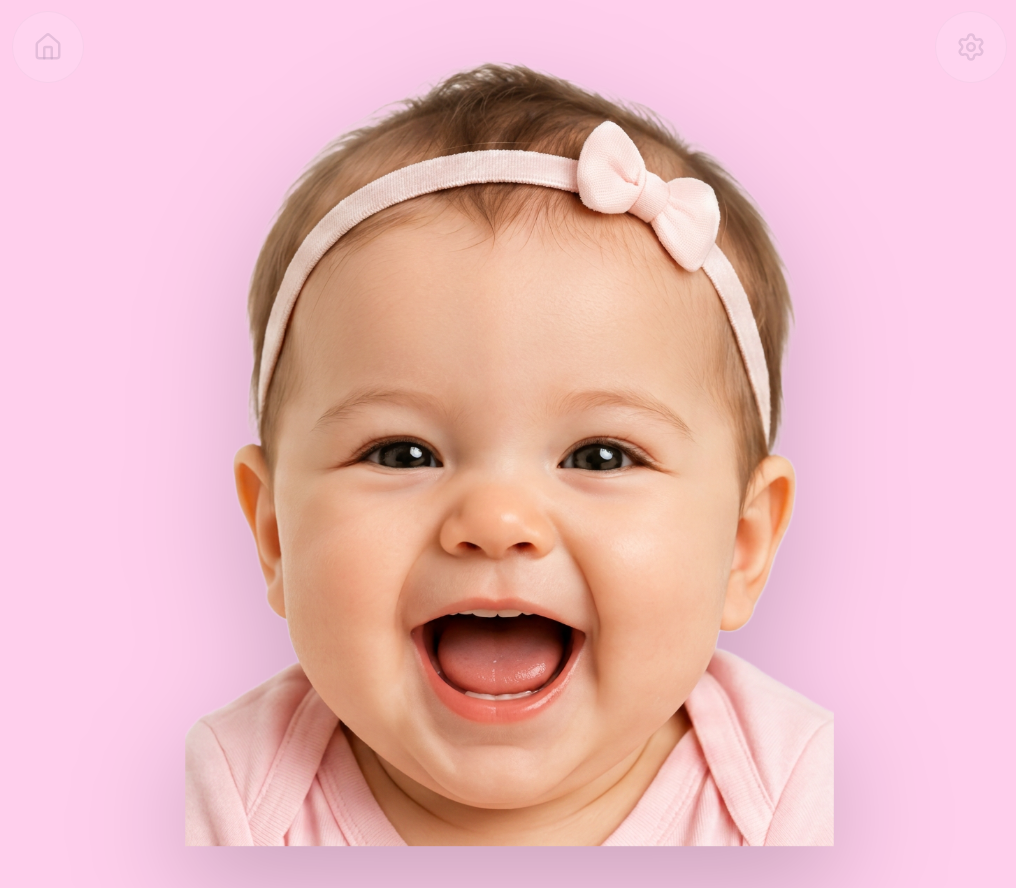 Baby's smile grows into a wide open-mouth giggle.