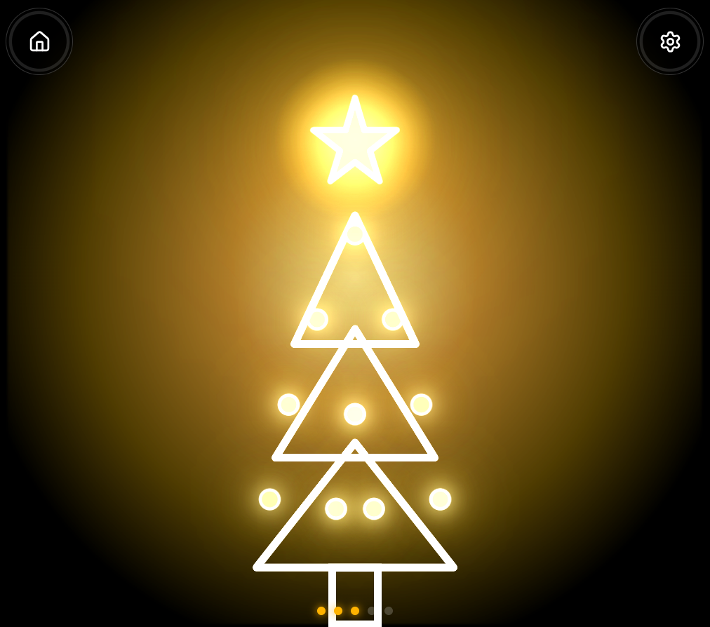 The star glows and the first lights appear on the tree.